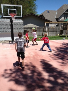 Children are playing two on two on their court.