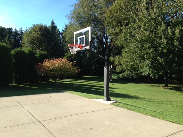 This angled shot of a Pro Dunk Gold Basketball system shows how easy and simplistic the installation can be.