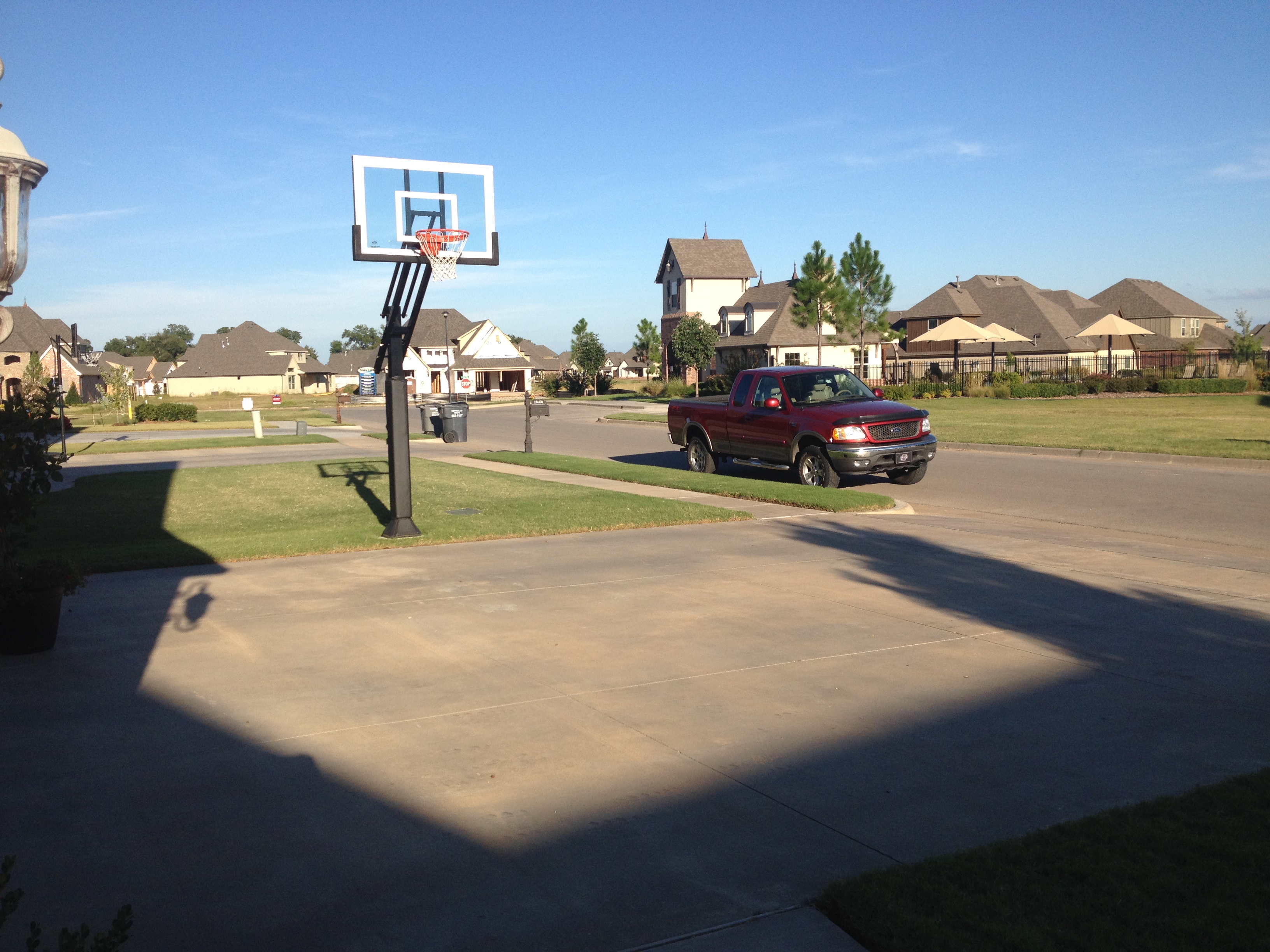 It is a beautiful day to go outside and play some basketball with your family or neighbors.