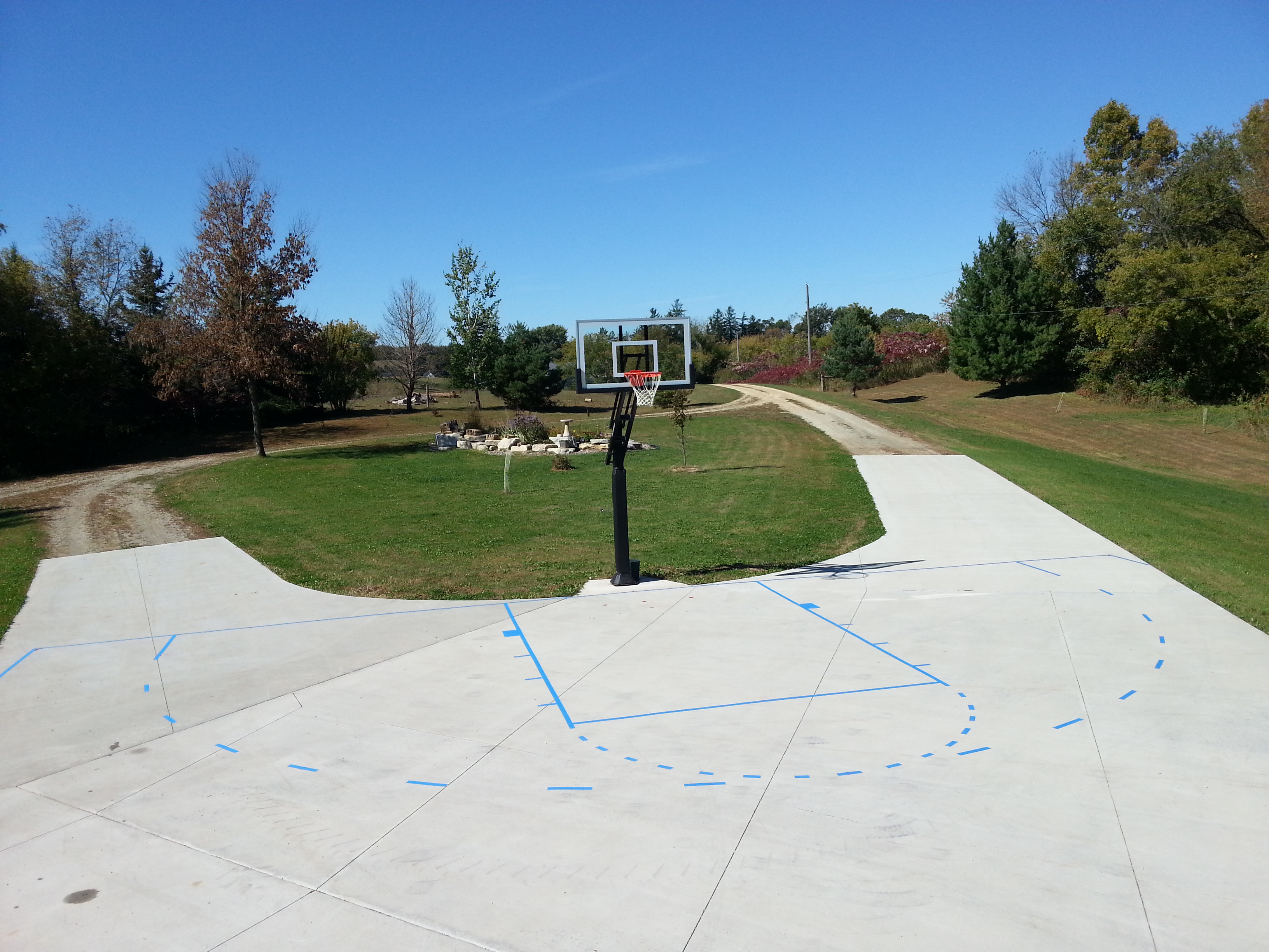 Almost finished with painting the lines on the driveway.