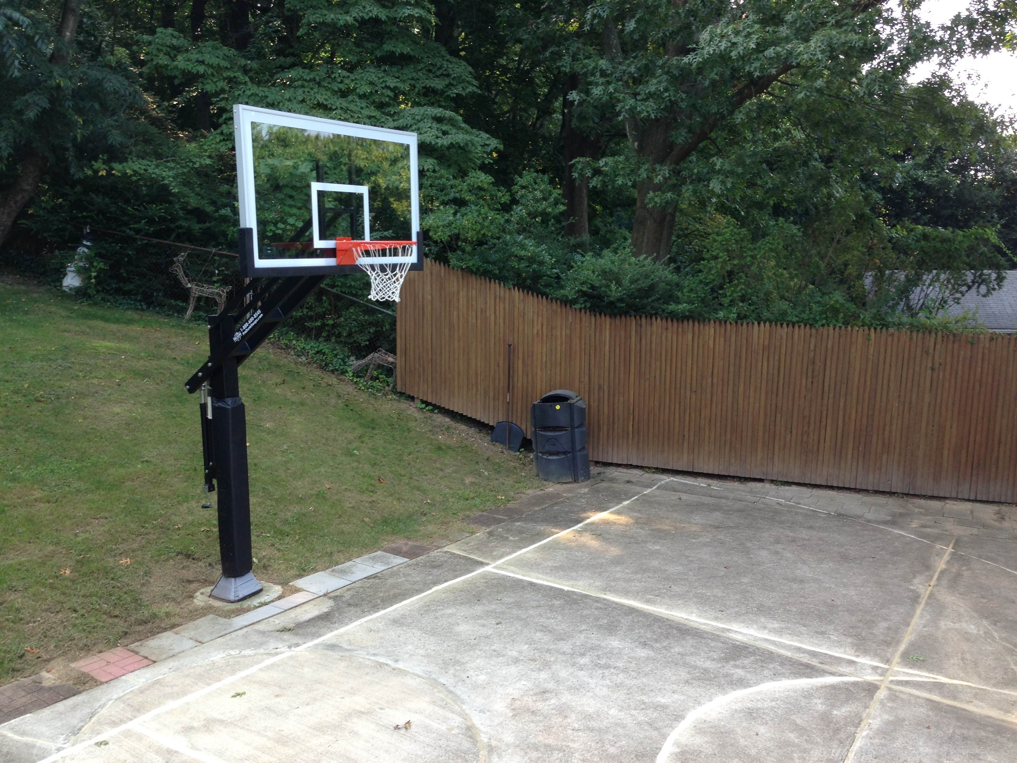 Pavers add a runway about the width of the key (12 feet) underneath the backboard giving players room run underneath without running in the grass.