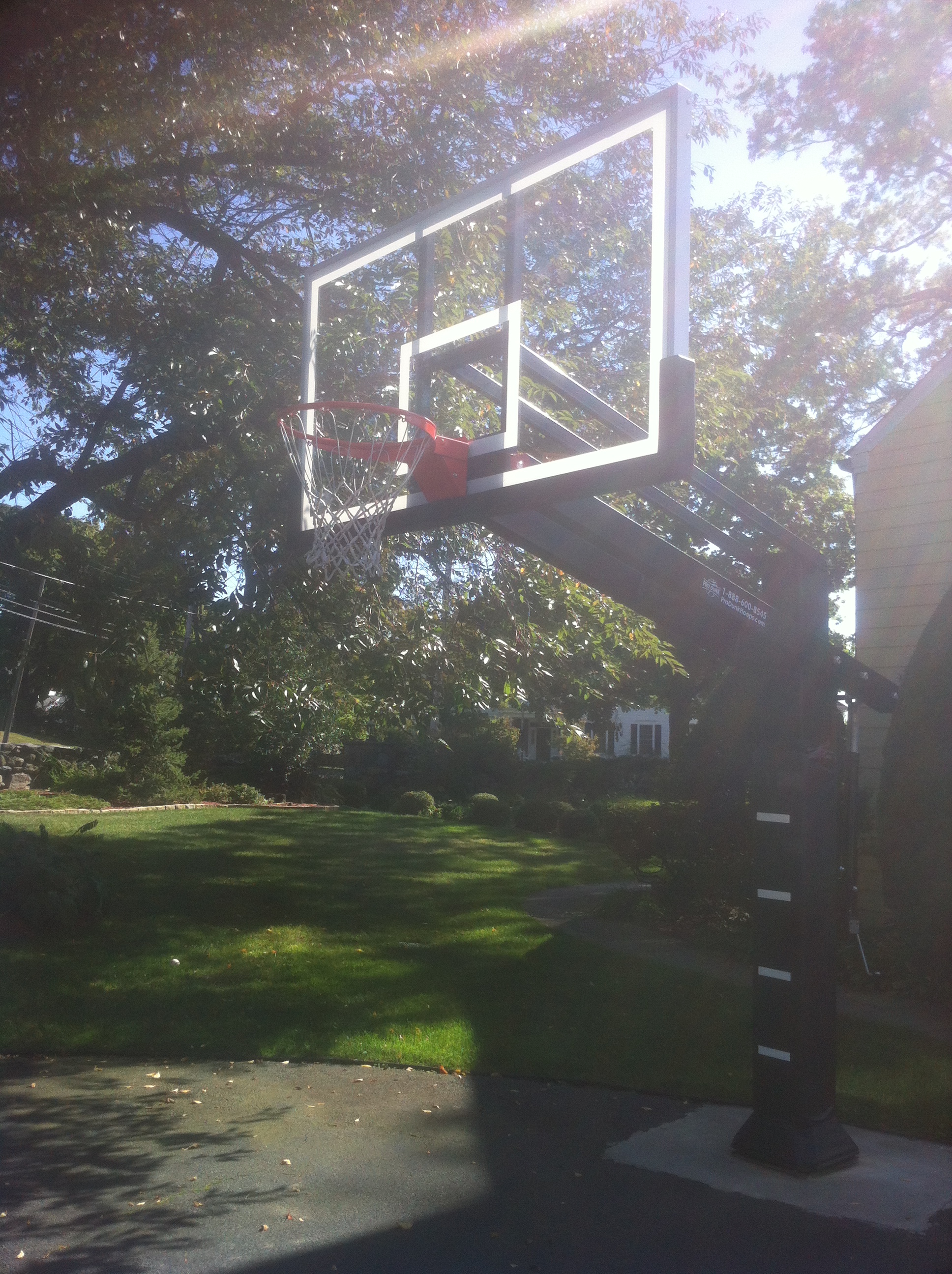 The bright sun and beautiful day really show off this Pro Dunk Diamond basketball system.
