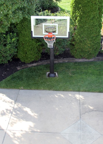 There is an aerial view of the hoop, it sits nicely beside the concrete driveway.