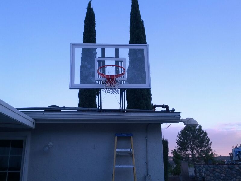 Backyard hoop on the roof.