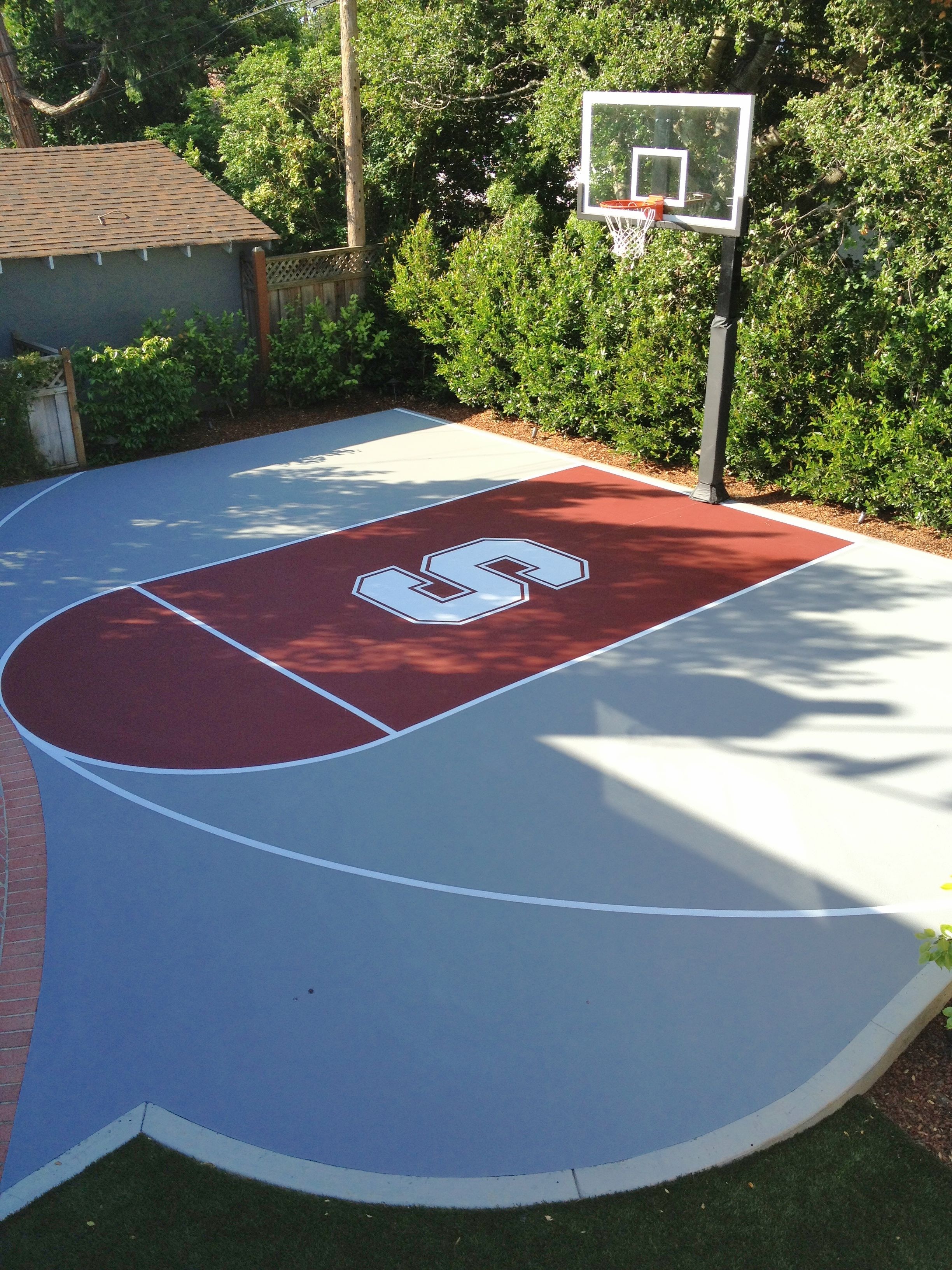 Mark has created a great Stanford half-court in his backyard complete with logo and Hercules Platinum basketball system.