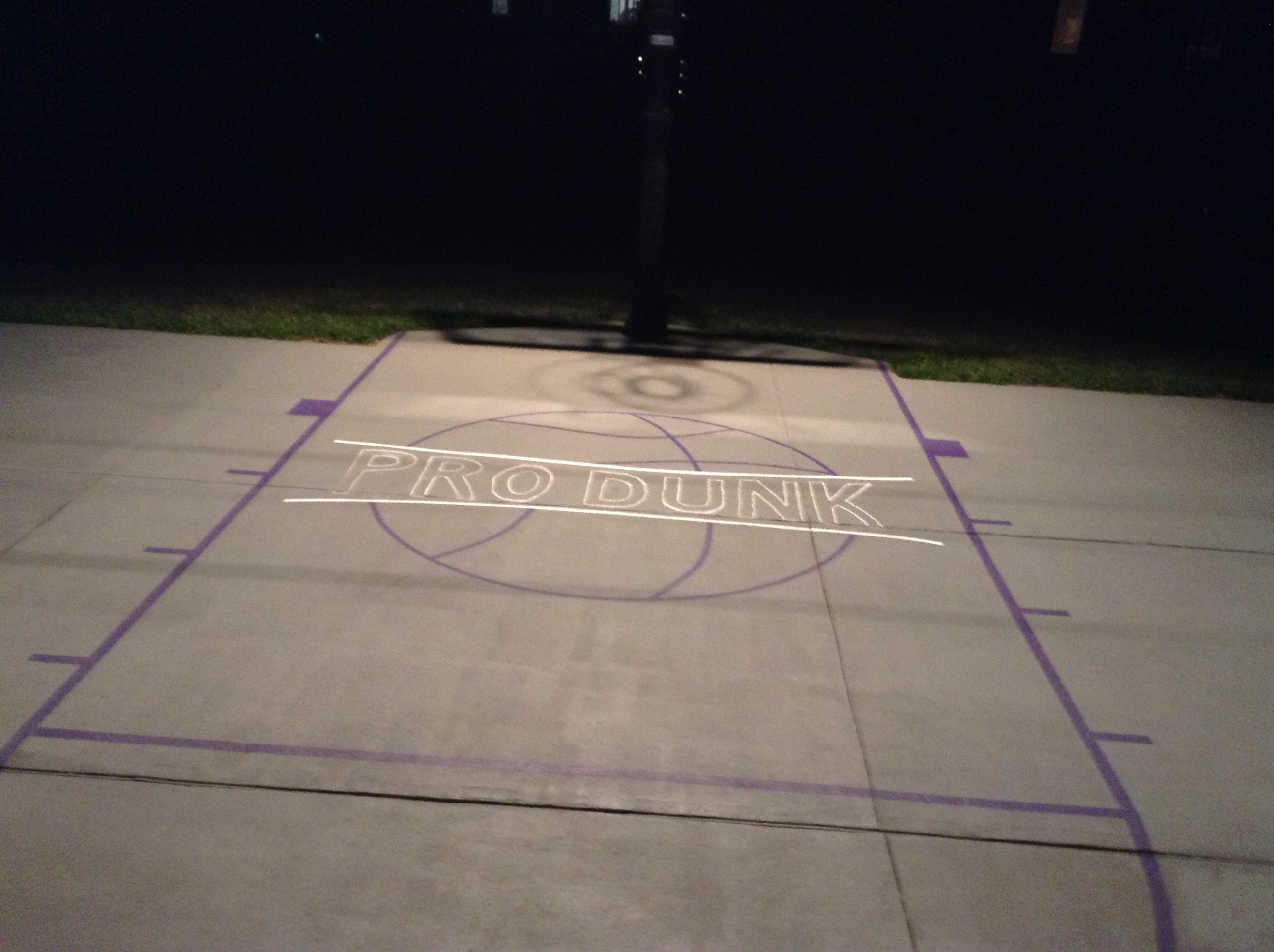 The concrete slab court is designed and hand painted by Robert and his 15-year-old son. 