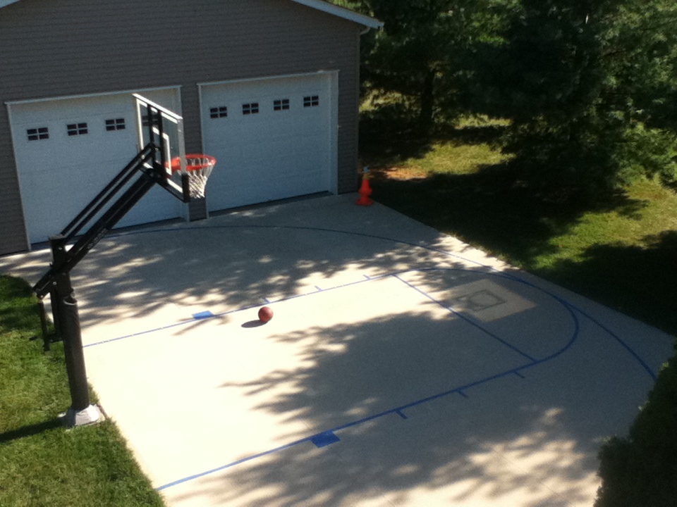 His wife insisted on the court markings so she painted it!