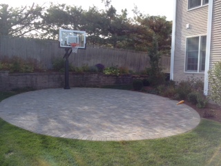 This Pro Dunk Silver Basketball system sits nicely in the backyard of this Rhode Island home.